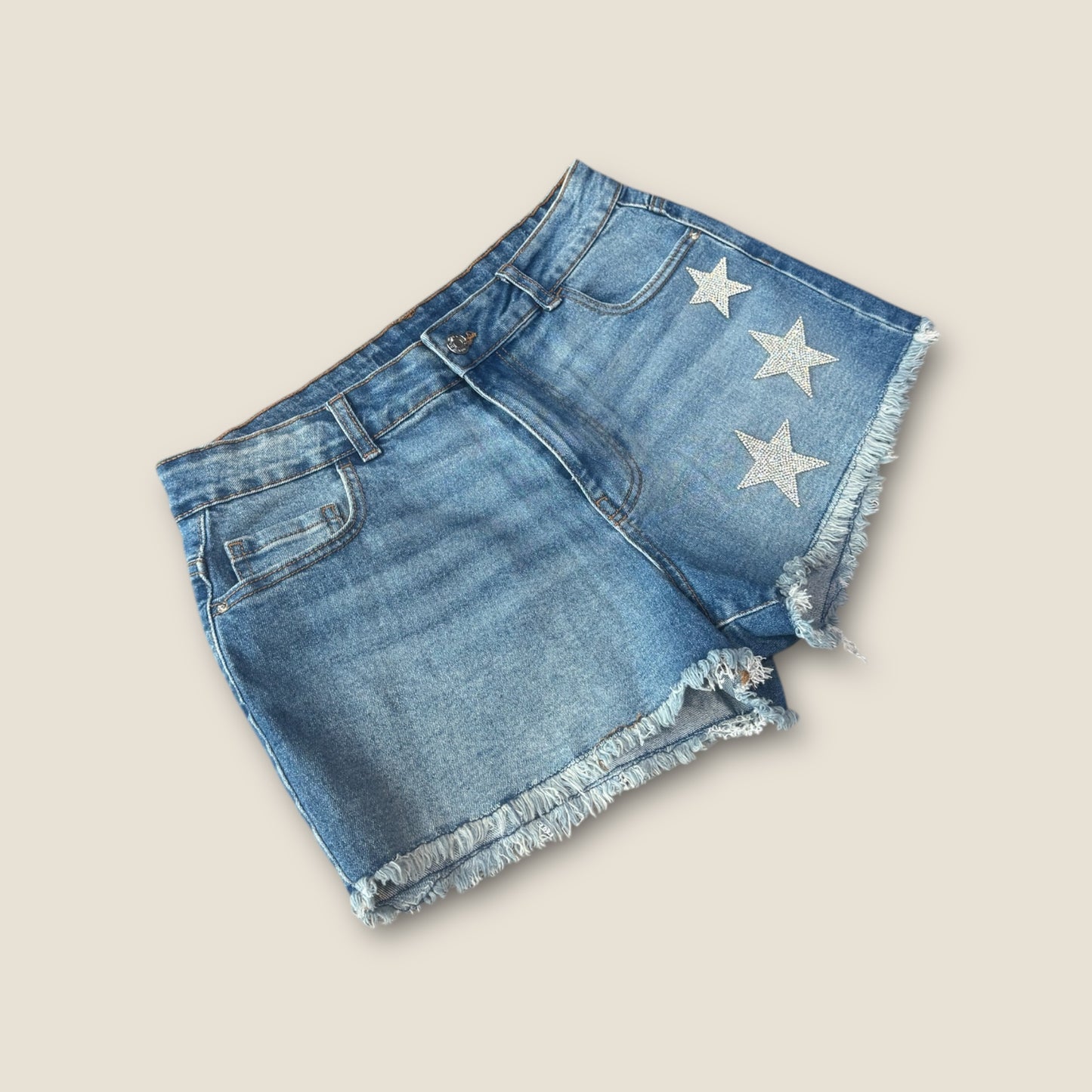 Pantalón vaquero corto estrellas strass