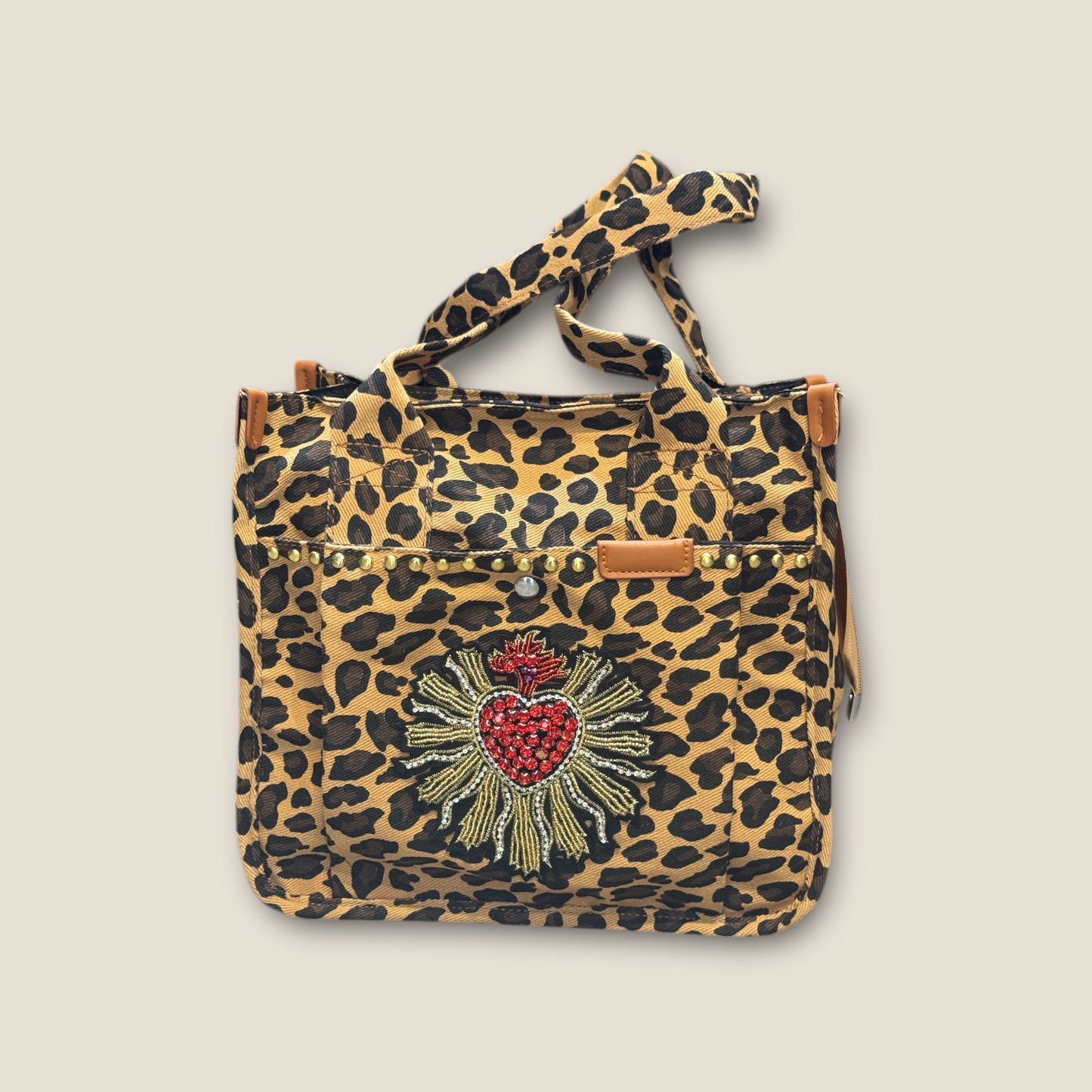Bolso animal print con sagrado corazón
