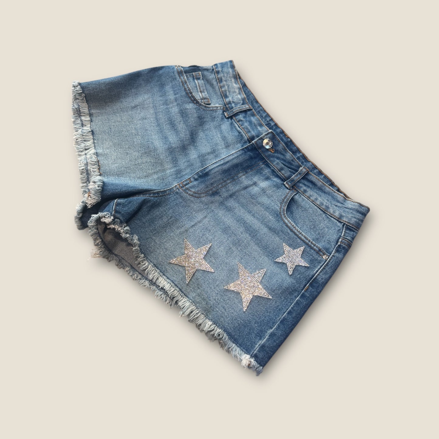 Pantalón vaquero corto estrellas strass