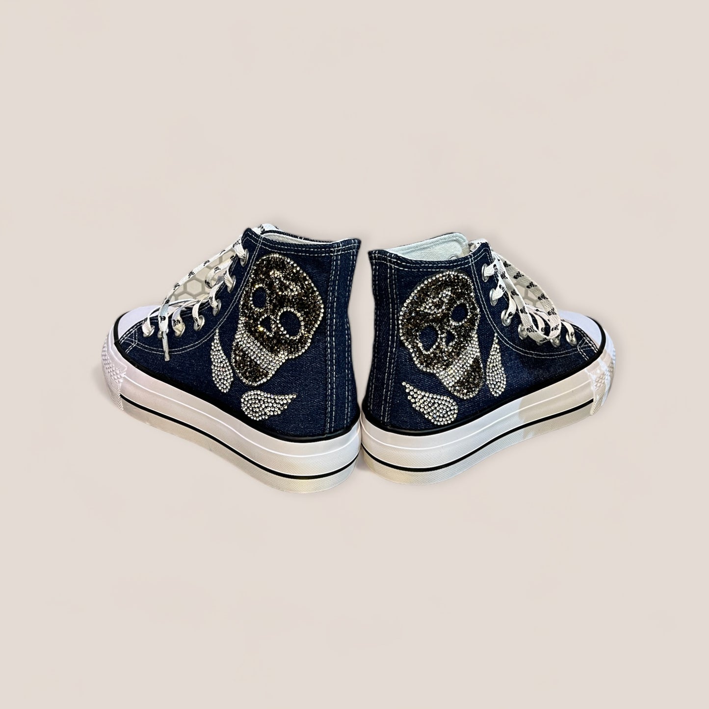 Zapatillas de lona con calavera y alas de strass
