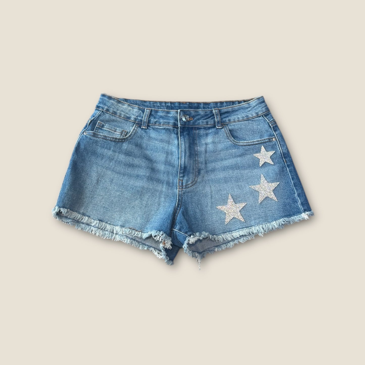 Pantalón vaquero corto estrellas strass