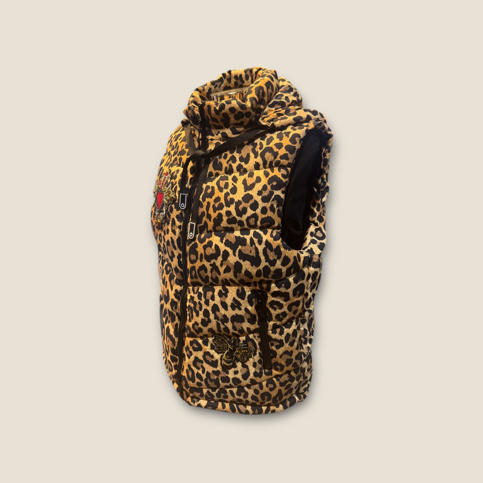 Chaleco acolchado animal print con parches