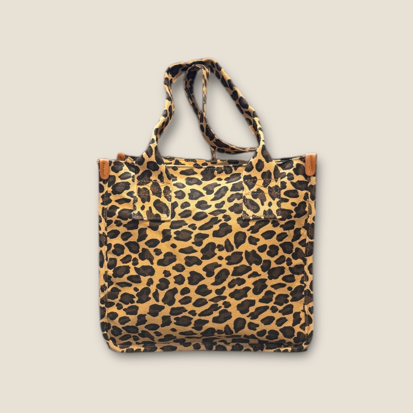 Bolso animal print con sagrado corazón