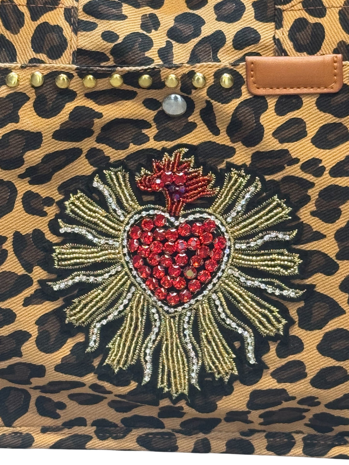 Bolso animal print con sagrado corazón