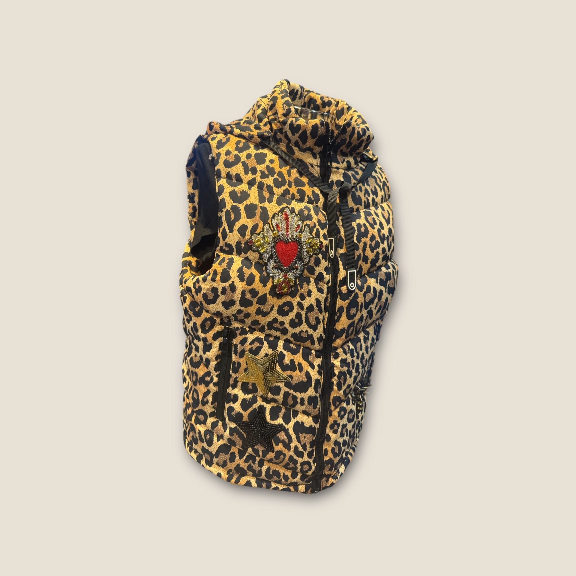 Chaleco acolchado animal print con parches
