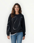 Sudadera tachuelas