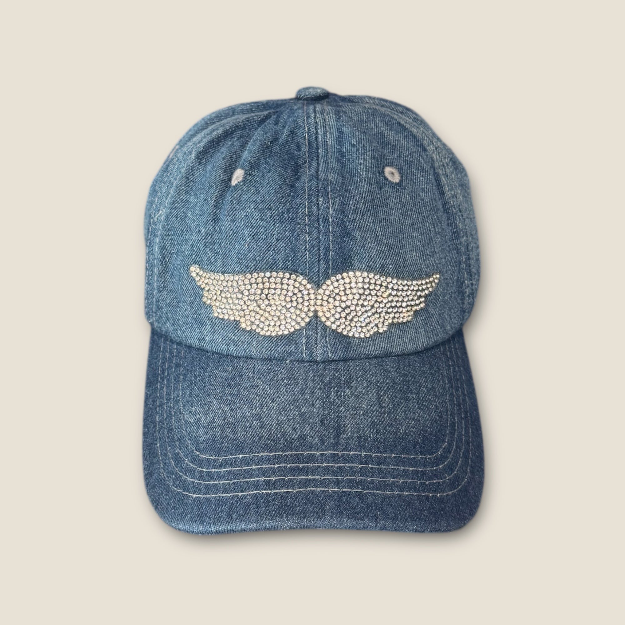 Gorra denim con alas de strass