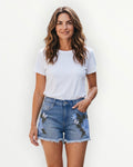 Pantalón corto flores y strass