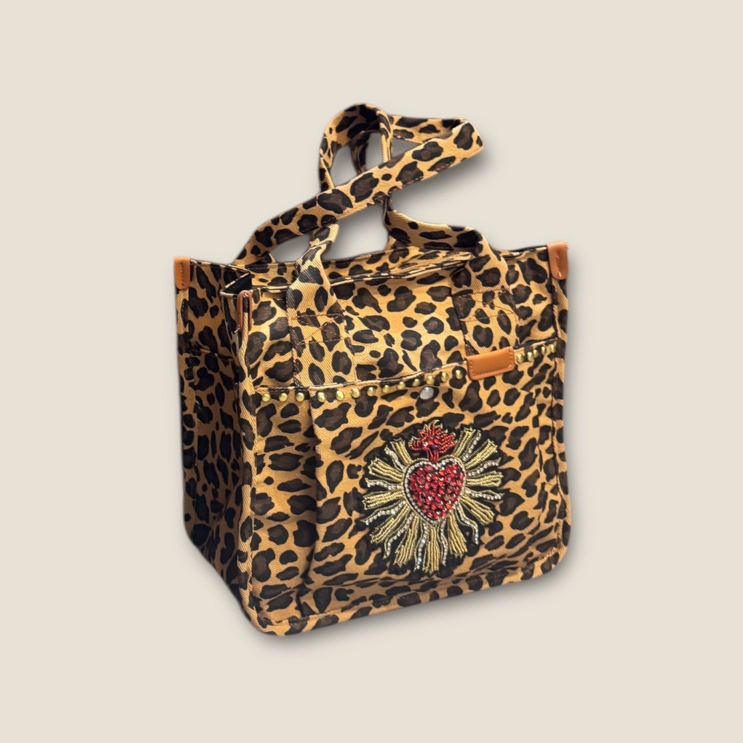 Bolso animal print con sagrado corazón