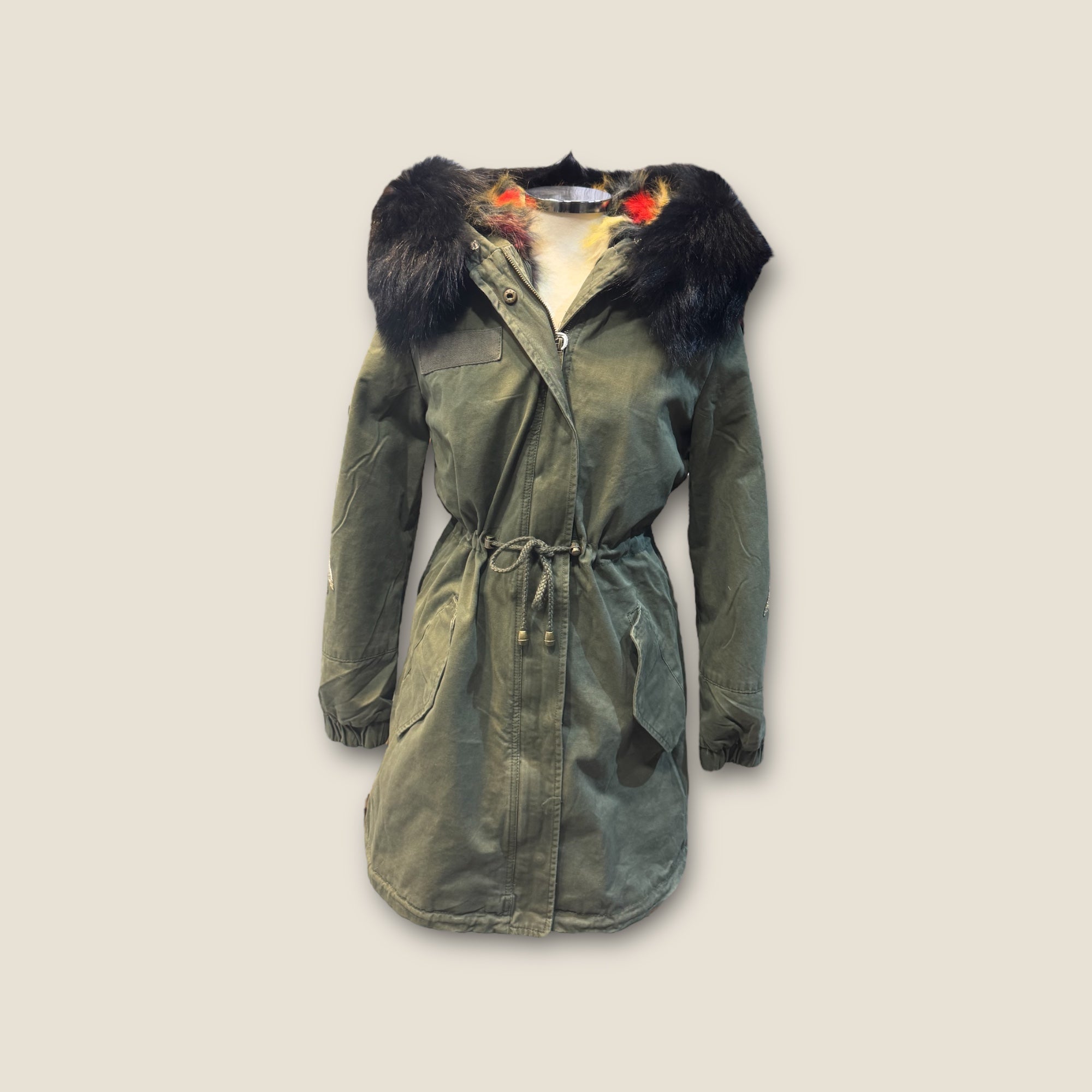 Parka 2 en 1 con alas de lentejuelas