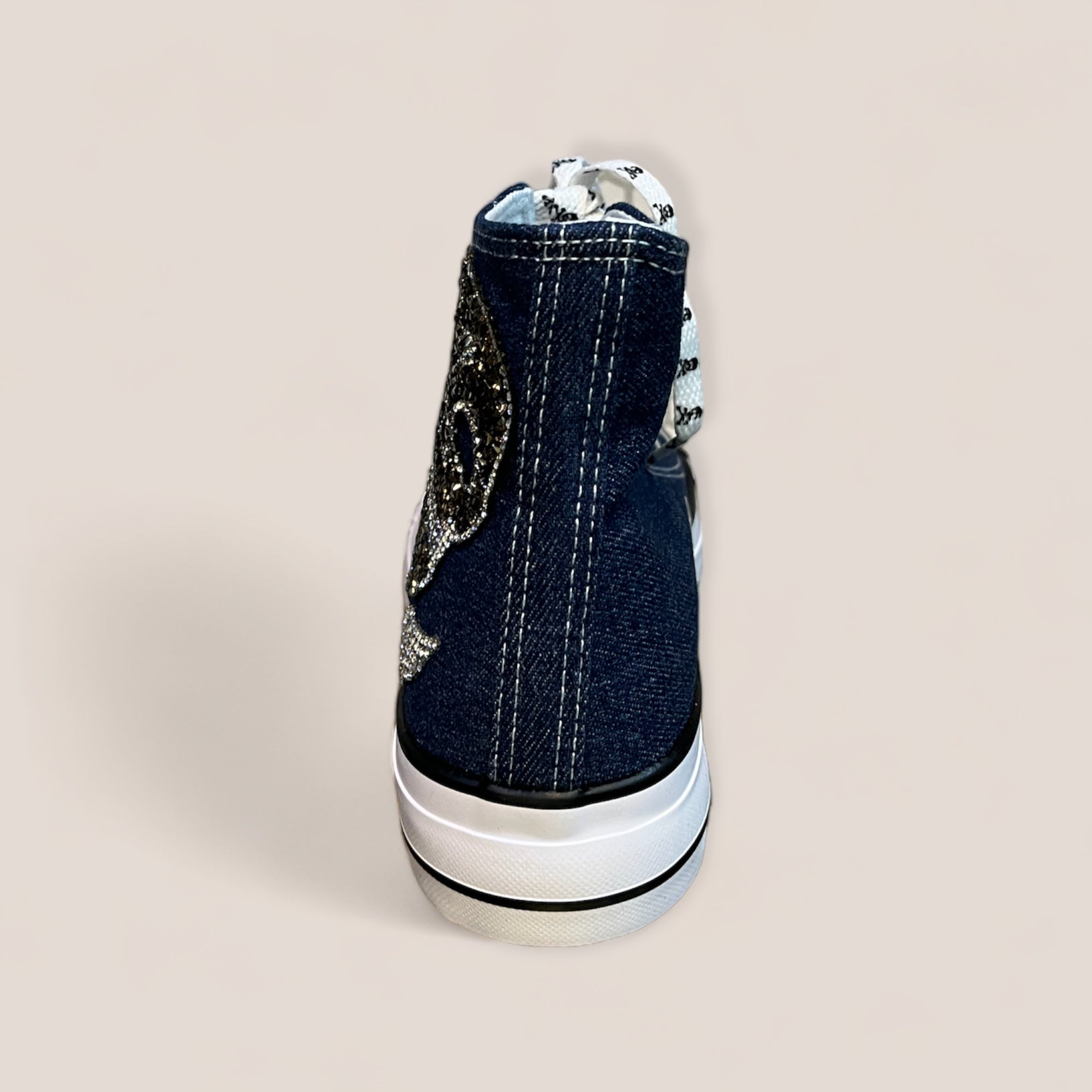Zapatillas de lona denim con calavera y alas de strass