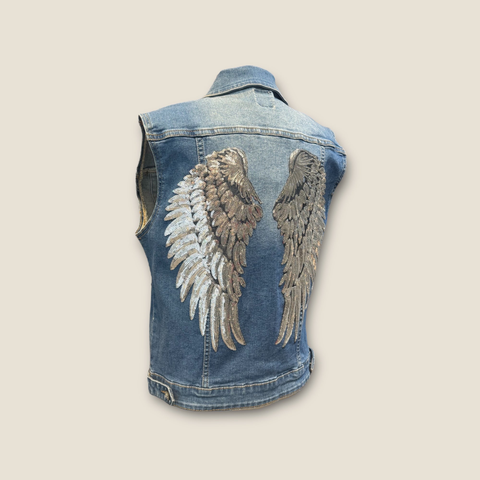 Chaleco vaquero alas lentejuelas
