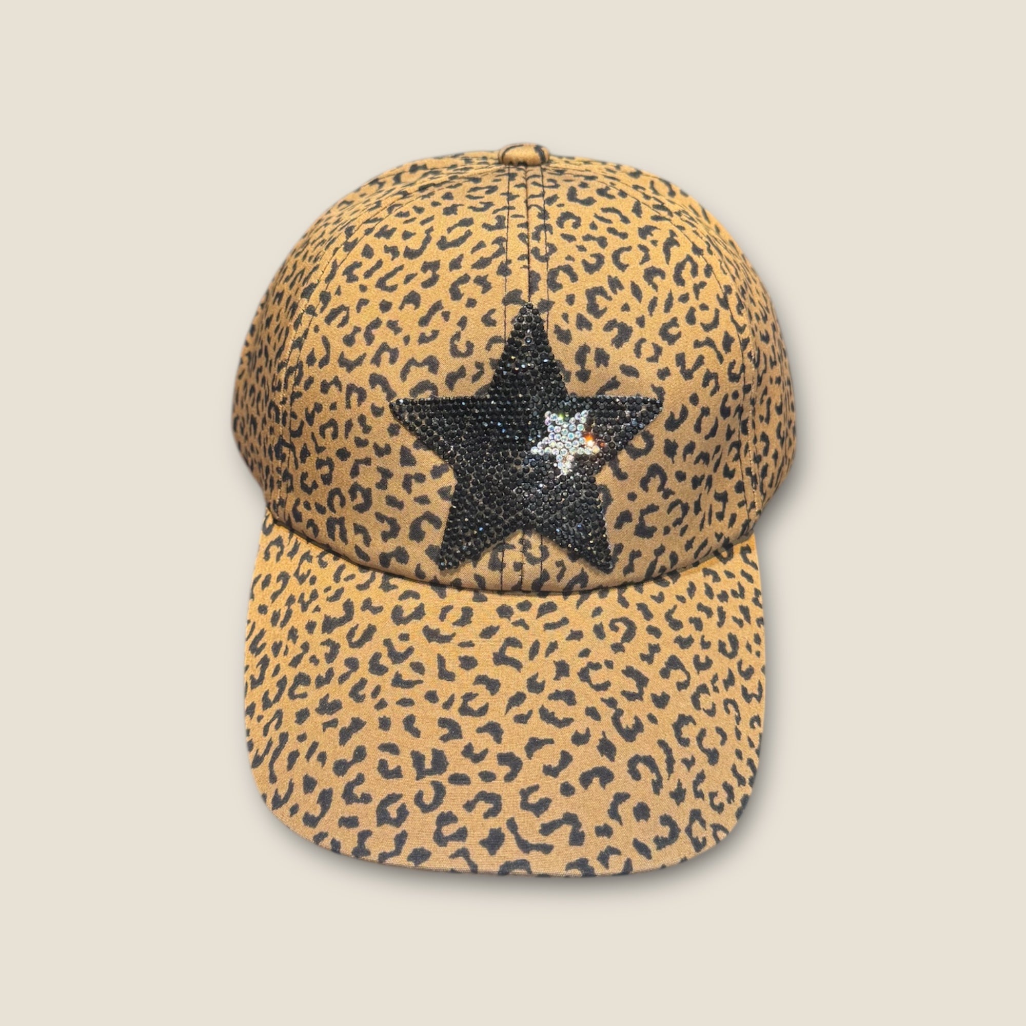 Gorra animal print con estrella