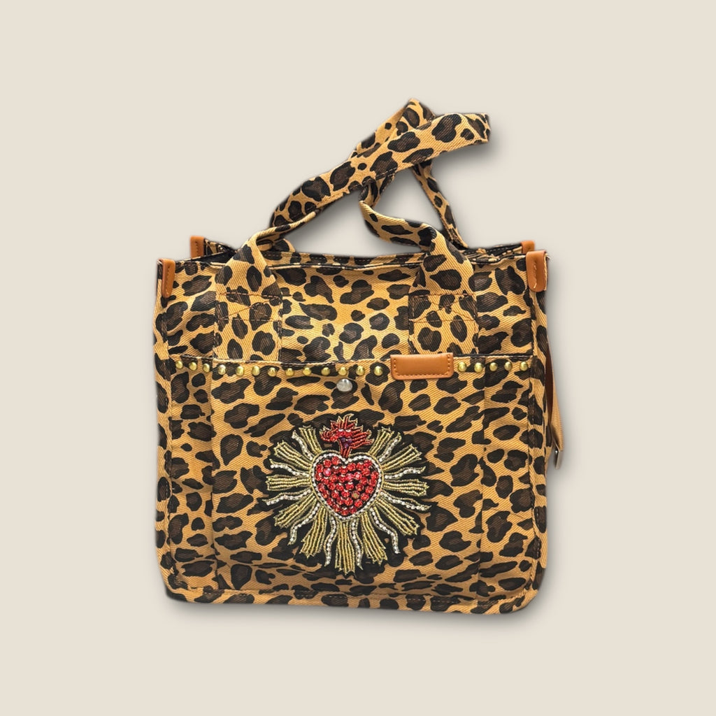 Bolso animal print con sagrado corazón