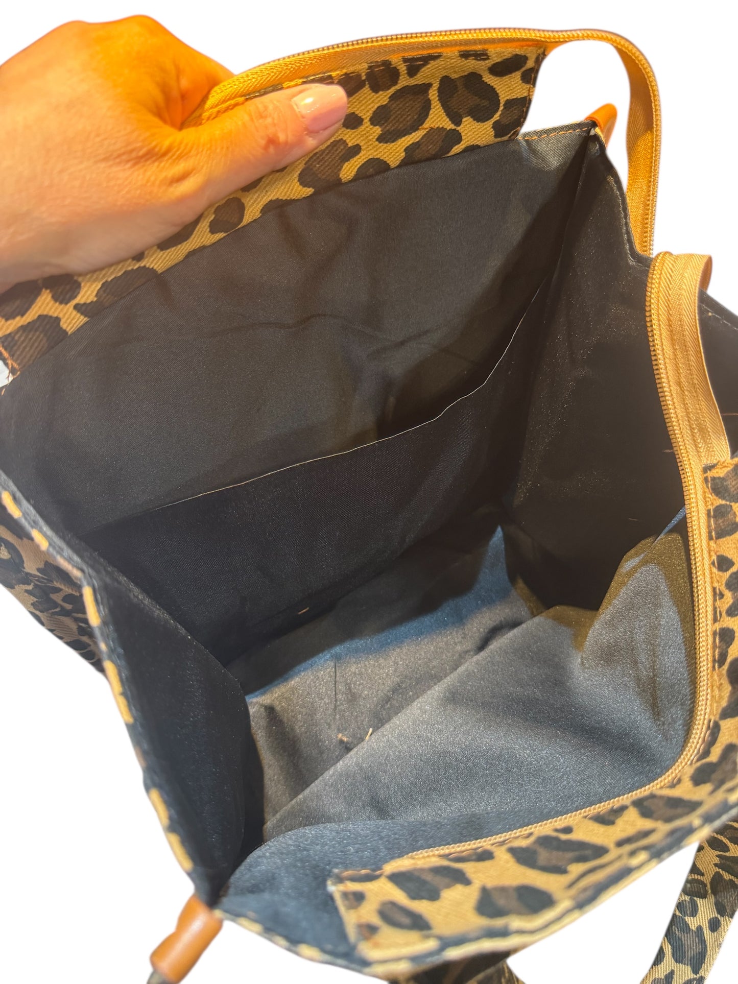 Bolso animal print con sagrado corazón