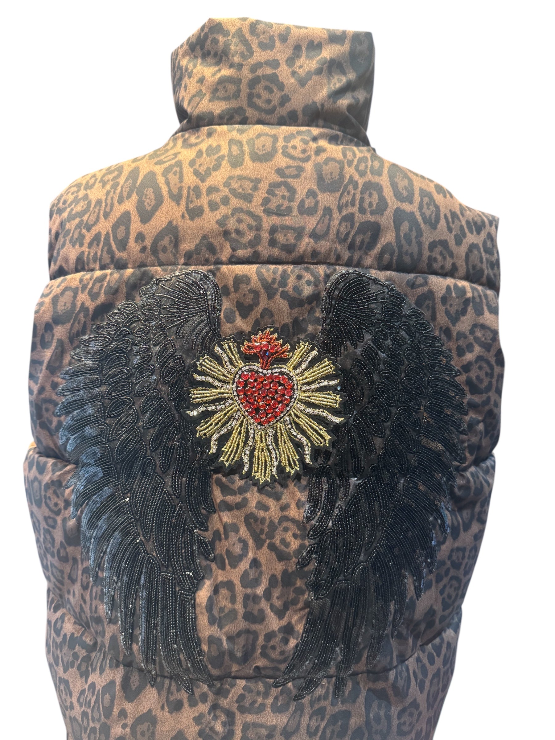 Chaleco animal print con alas
