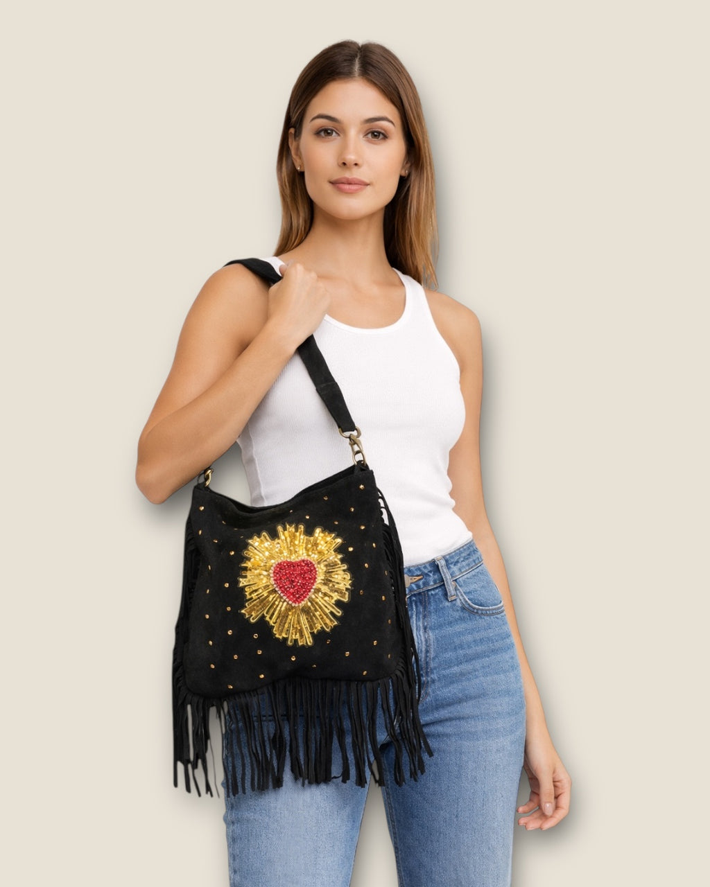 Bolso bandolera ante con flecos y corazón de pedreria